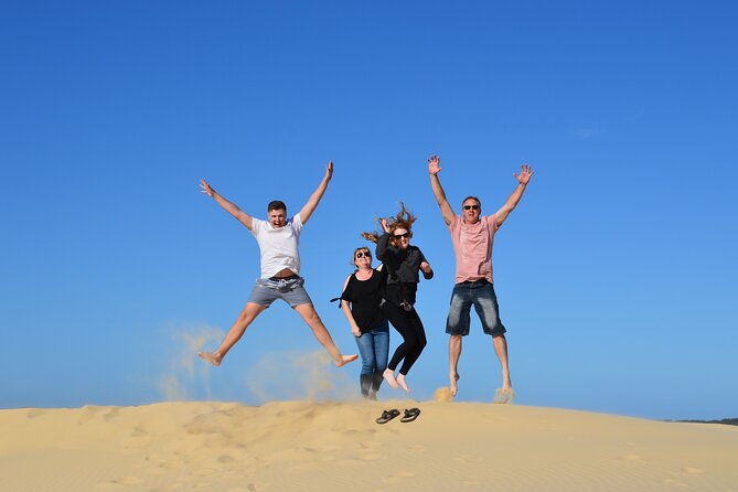 Port Stephens + Whale Watching + 4WD/Sandboarding ex Sydney - Crossing the dunes by 4WD