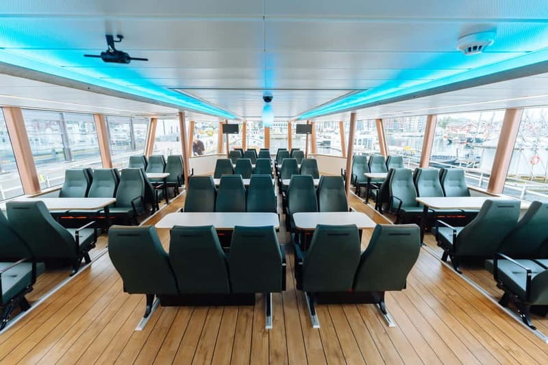 Tromsø: Whale Watching on hybrid boat with scenic bustrip - What the $208 price is really buying
