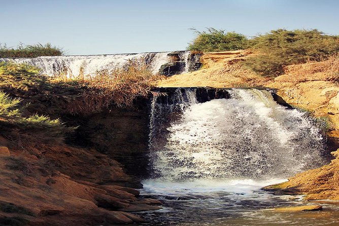 Valley of Whales and Wadi El Rayan Water Falls Day Tour from Cairo - Tunis Village gives the day an easy beginning