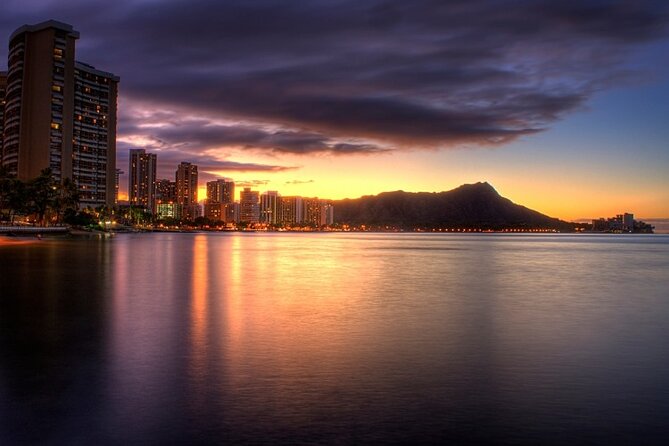 Whale Watching and Sunrise Breakfast Cruise in Honolulu - Sunrise over Waikiki, with whales somewhere beyond the reef
