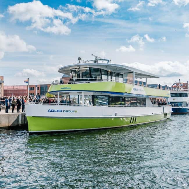Wismar: Electric Boat Tour past Whale Island with Poel Stop - Seeing Wismar’s working waterfront from the water